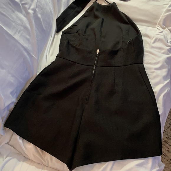 Black cocktail romper with large bow tie - Picture 3 of 5